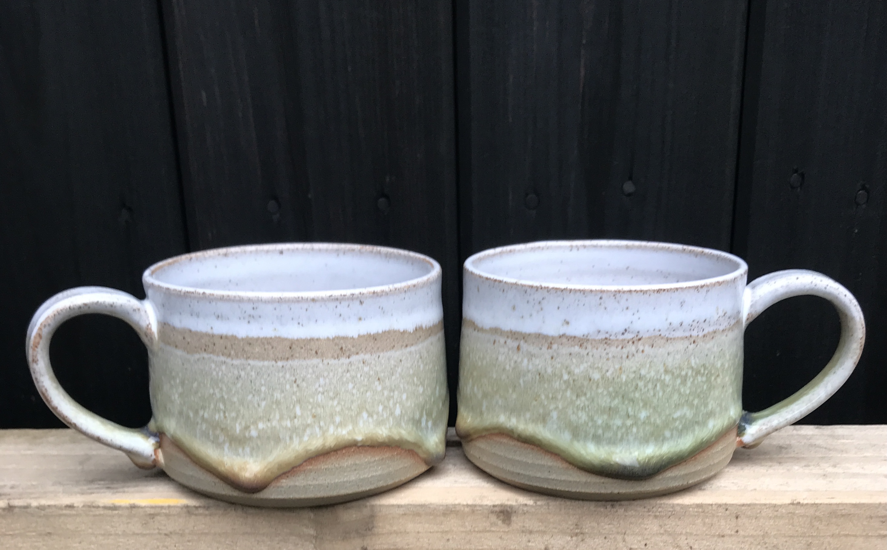Satin green stoneware mugs Satin green stoneware mugs